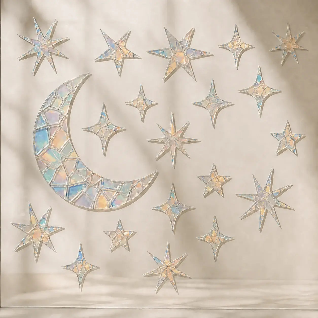 Celestial Moon and Stars prismatic window cling set shown on a plain background