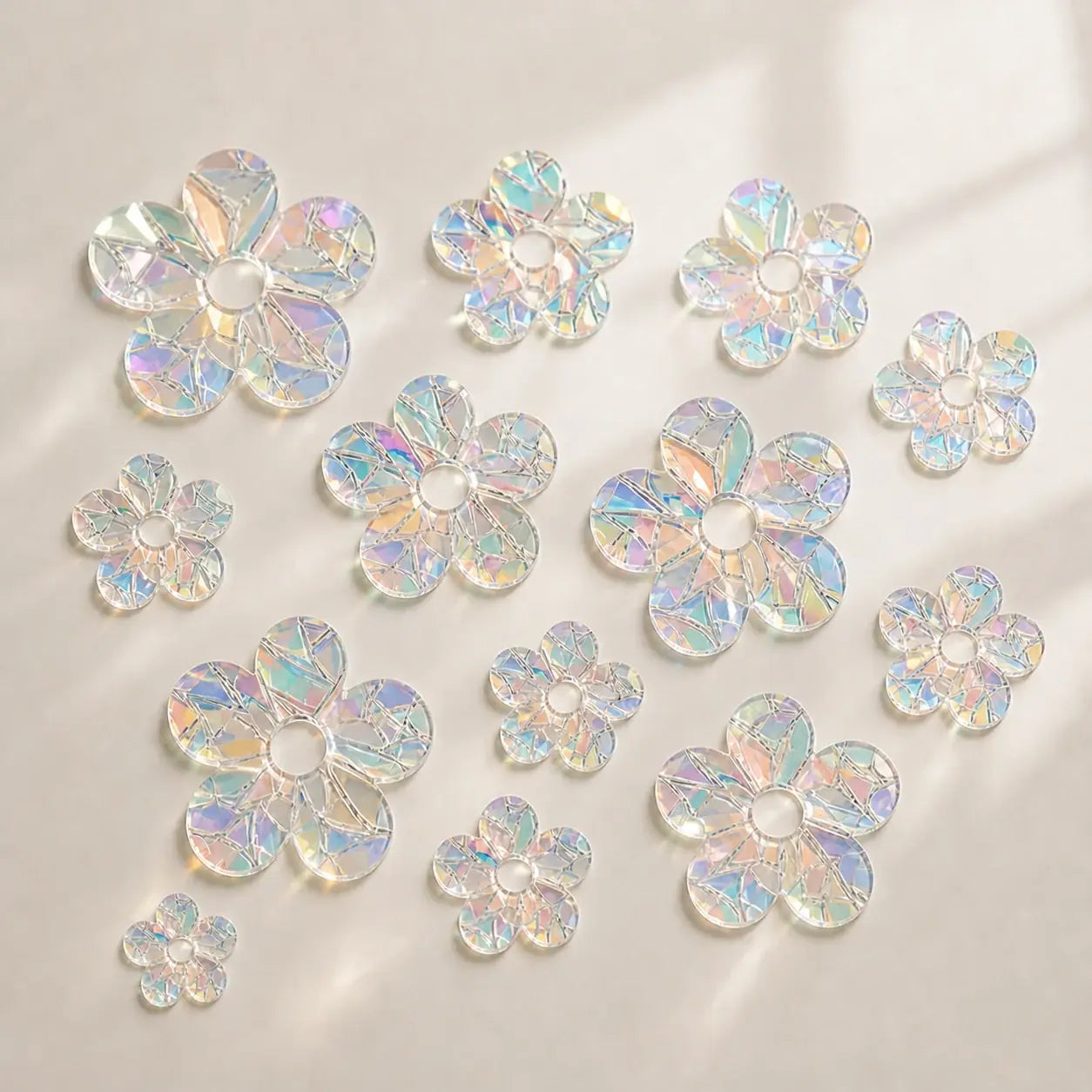 Iridescent Flowers set with thirteen prismatic window clings shown on a plain background